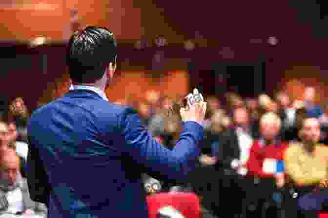 A Person Giving A Presentation To A Large Audience 100 Decrees To Breakthrough In Business: Speaking Strategies To Build Success