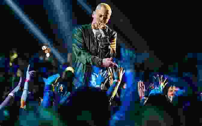 Eminem Performing Live On Stage, Captivating The Audience With His Electrifying Energy. Eminem (Superstars Of Hip Hop) Z B Hill